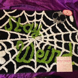 Betsey Johnson "Stay weird" Halloween bath rug